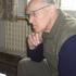He´s reading the report´s of Discussion forum in the web Memory of Nation